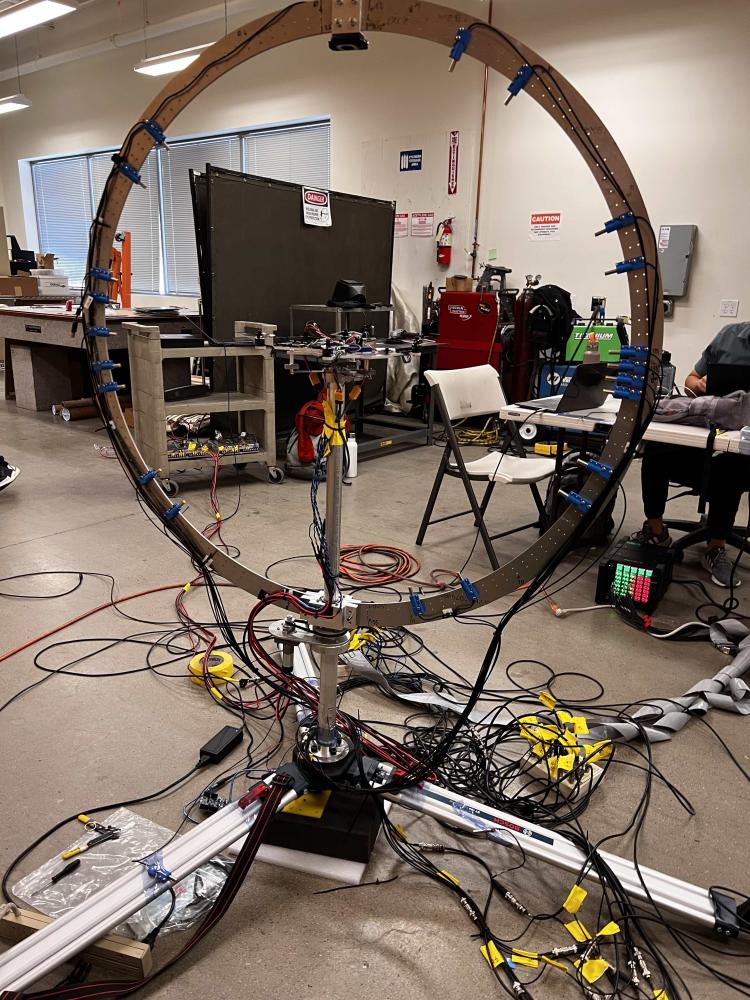 Physical representation of continuous scan array, with microphones and wiring visible.