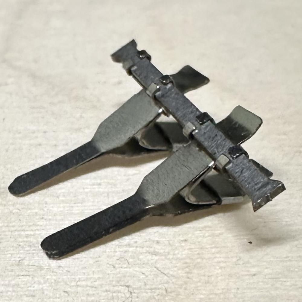 Close up of folded double clamps