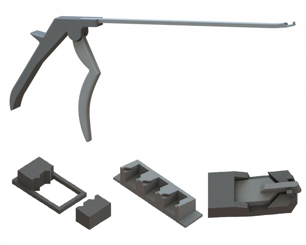 Rendered CAD image of the endoscopic tissue stapler, staple die, staple cartridge, and staple remover.